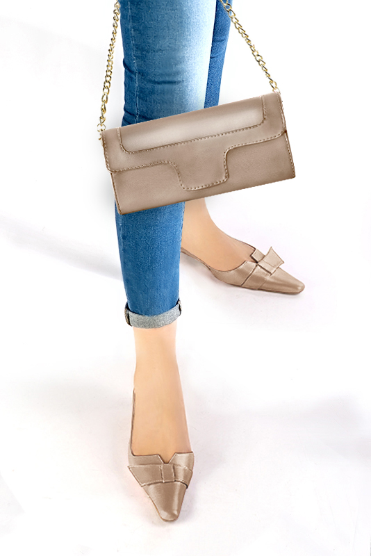 Women's tan beige luxurious elegant clutch for ceremonies, weddings and evenings out. - Worn view